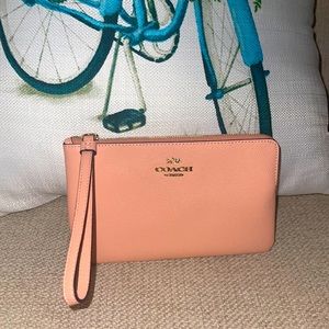 Faded blush coach wristlet 💖